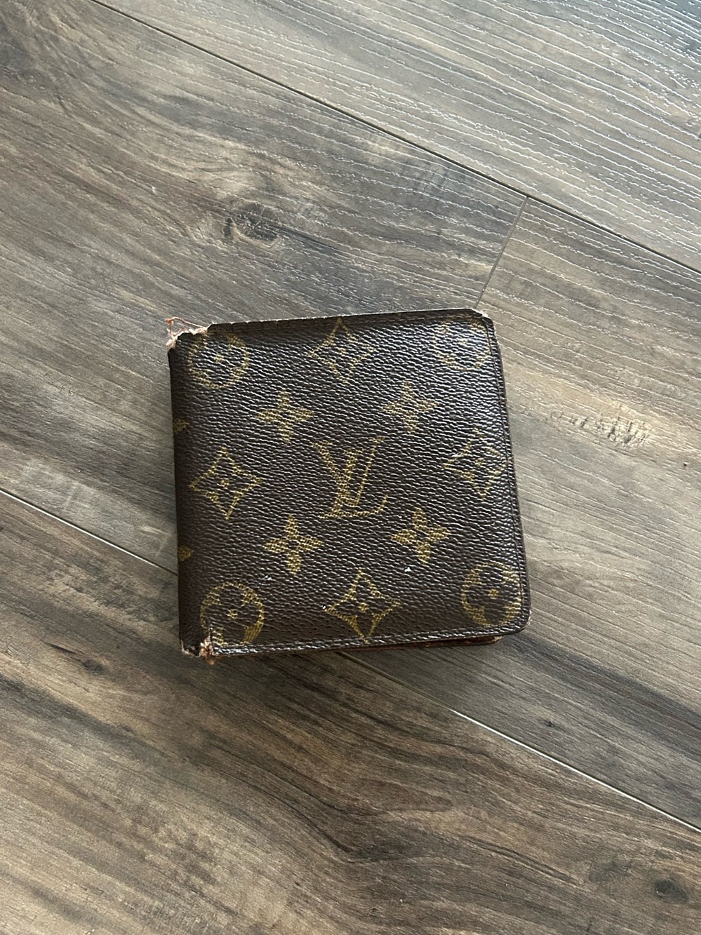 Louis Vuitton Monogram Canvas Wallet in Brown